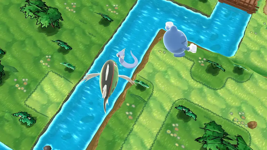 Basculin, Poliwhirl and Dratini in the Route 21 river in Pokémon X and Y, with the grass banks and a wooden bridge in the background