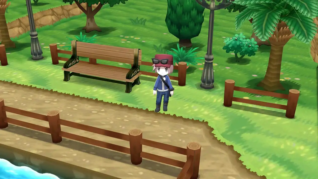 Calem standing by the pond in the north of Kiloude City in Pokémon X