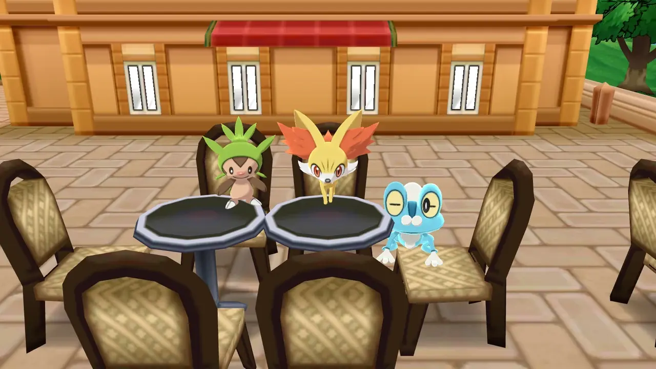 Pokémon X and Y starters Chespin, Fennekin and Froakie at the café table in Aquacorde Town