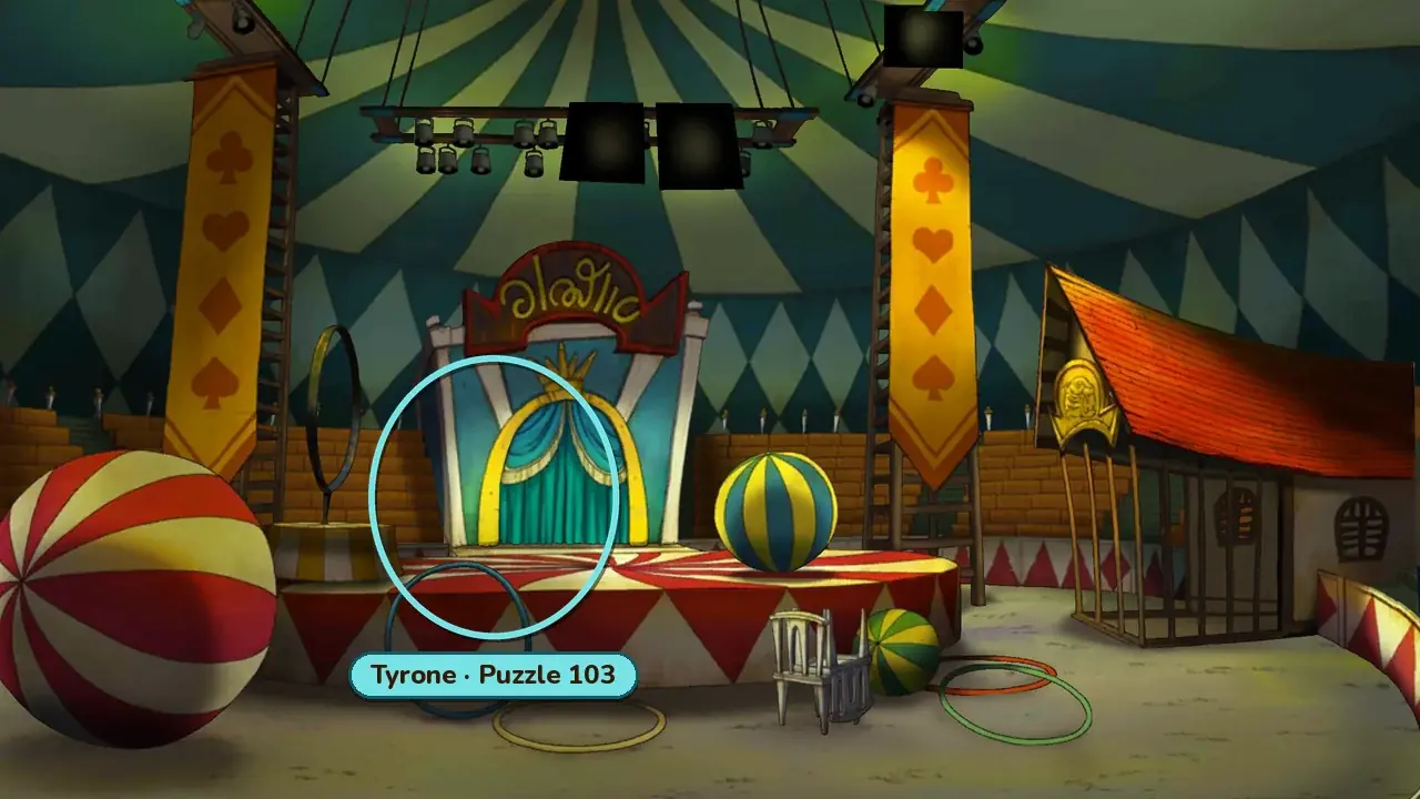 Inside the Big Top: rows of seats around a circus ring with a curtained stage at the back, a teal ring at the stage curtain and a gold label reading Tyrone, Puzzle 103
